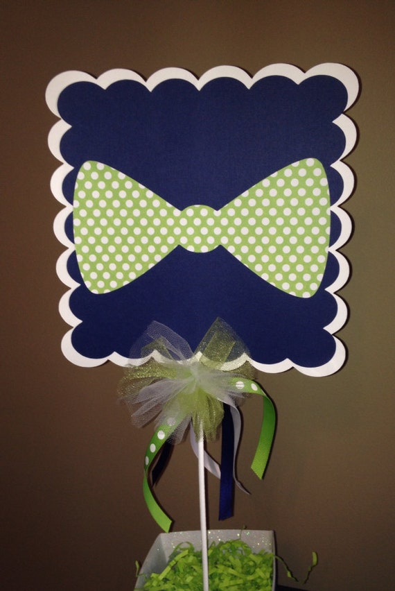 A 2pc bow tie sign centerpiece