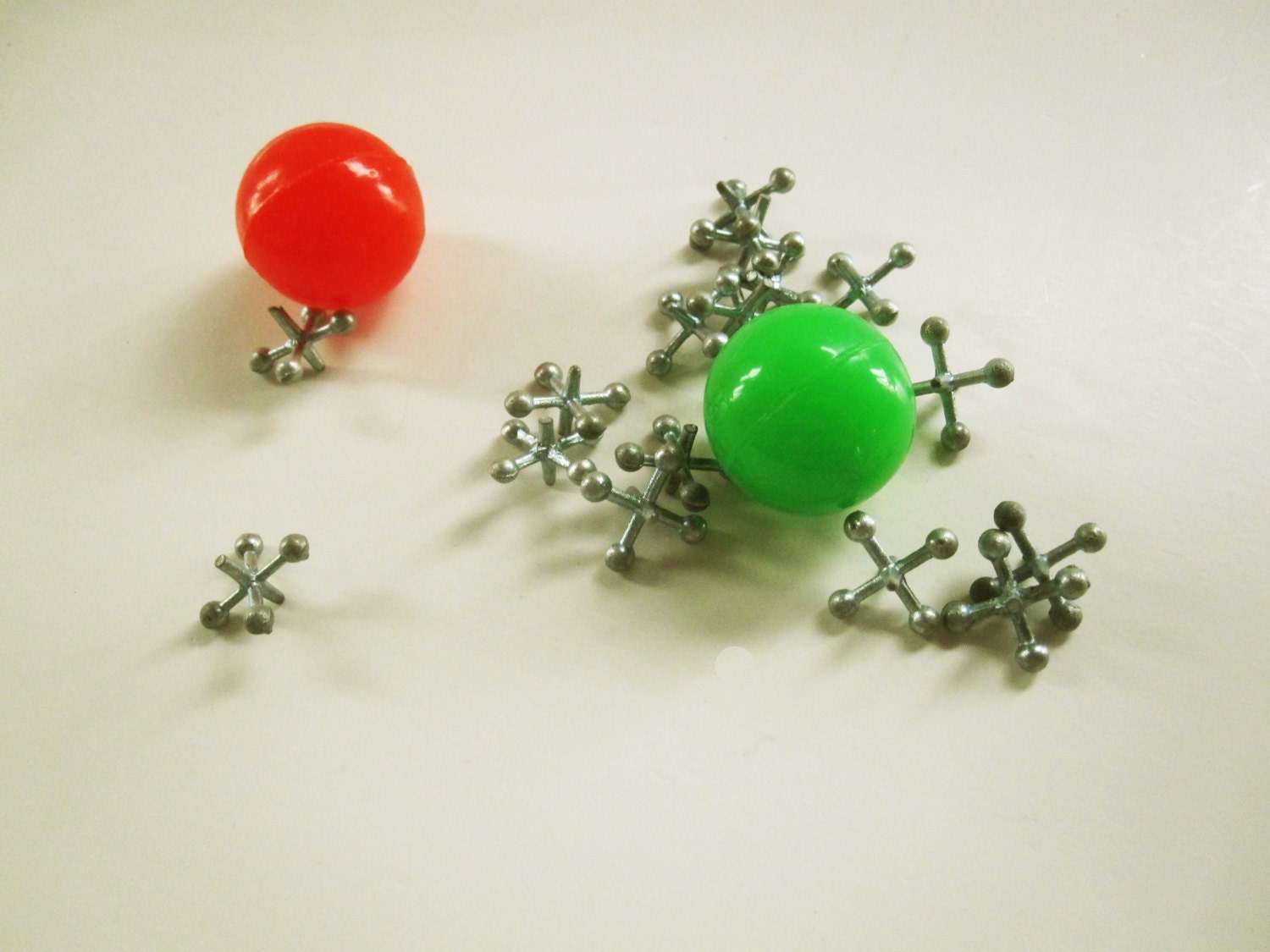 Ball and Jacks Two Balls and Sixteen Jacks to Play the Game