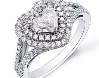 radiant cut diamond ring with side stones