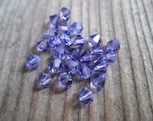 25  tanzanite purple 4mm bicone swarovski beads crystal beads beading supplies jewelry making supplies
