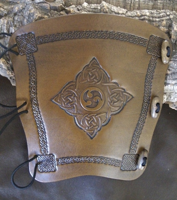 Embossed Celtic Triskele leather archery arm guard bow