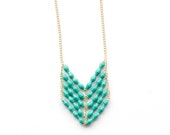 African paper bead chevron necklace in teal. Made using recycled paper. Sales fight poverty in Uganda.
