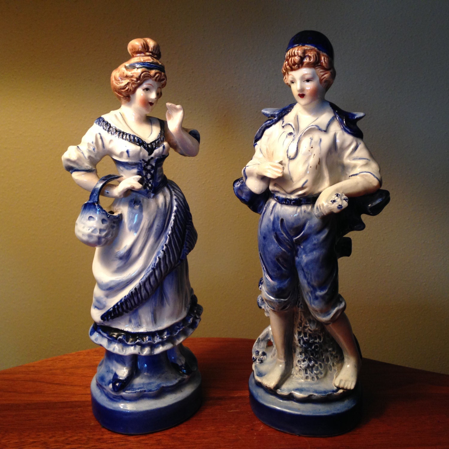 antique colonial figurines