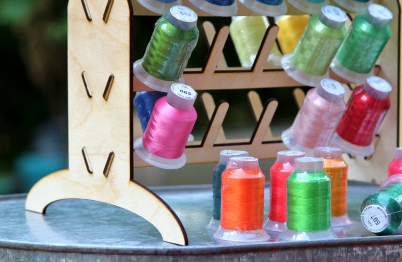 Embroidery thread organizer holds 50 spools vertically taking Embroidery thread organizer holds 50 spools vertically taking