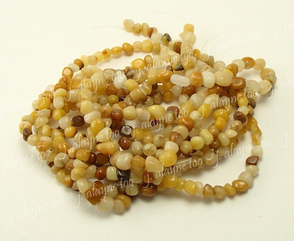 Golden Jade Strand. Quartz Stone. Quartz Pebble. Semiprecious