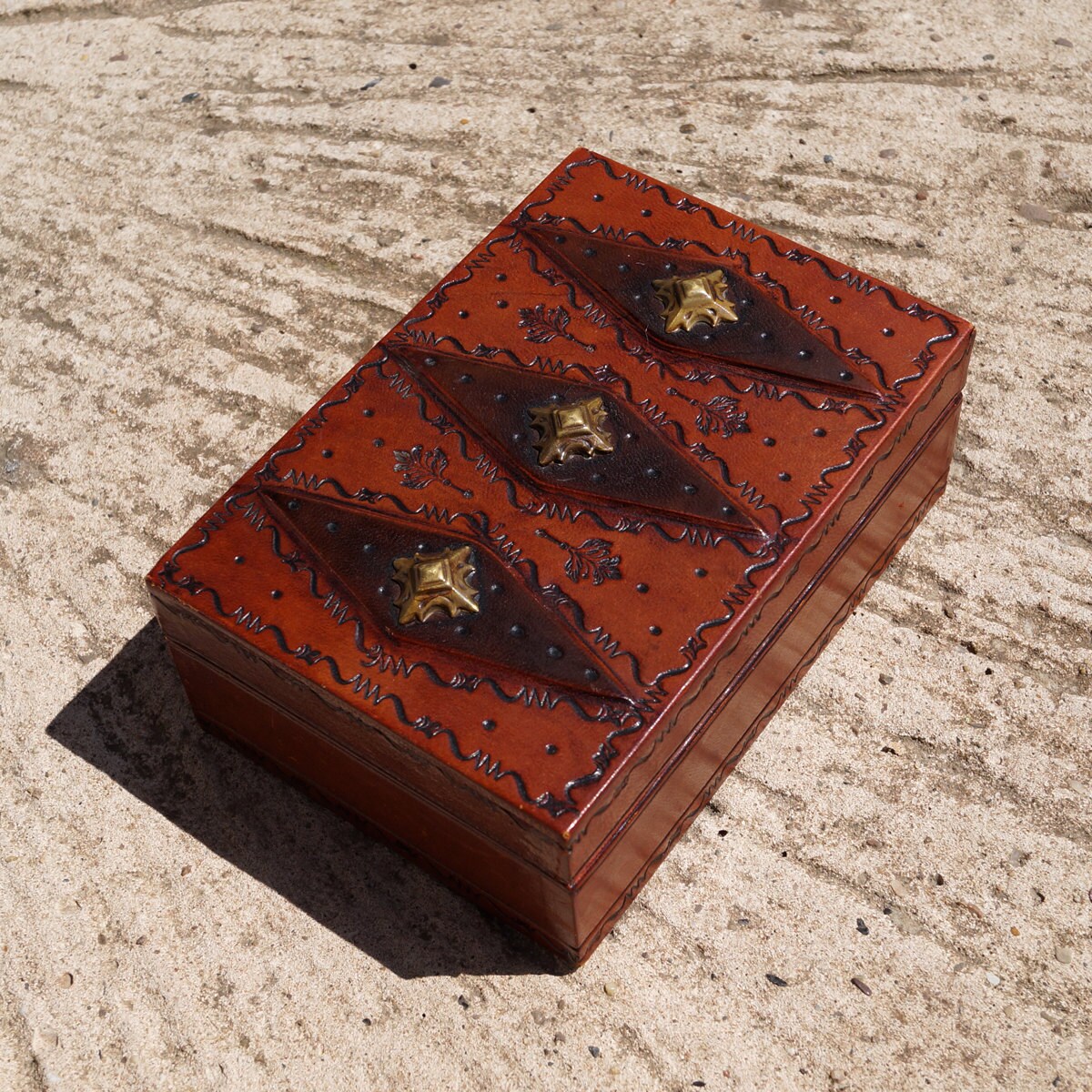 Jewellery box with a leather skin made in Italy wood , brass alloy