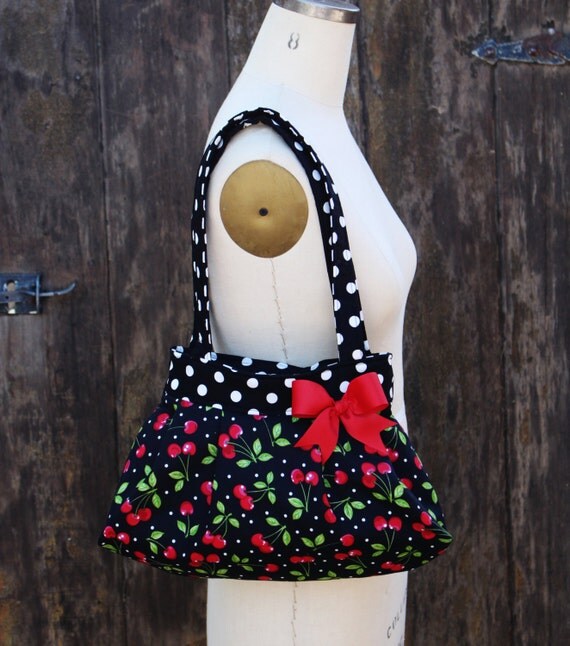 red polka dot purse