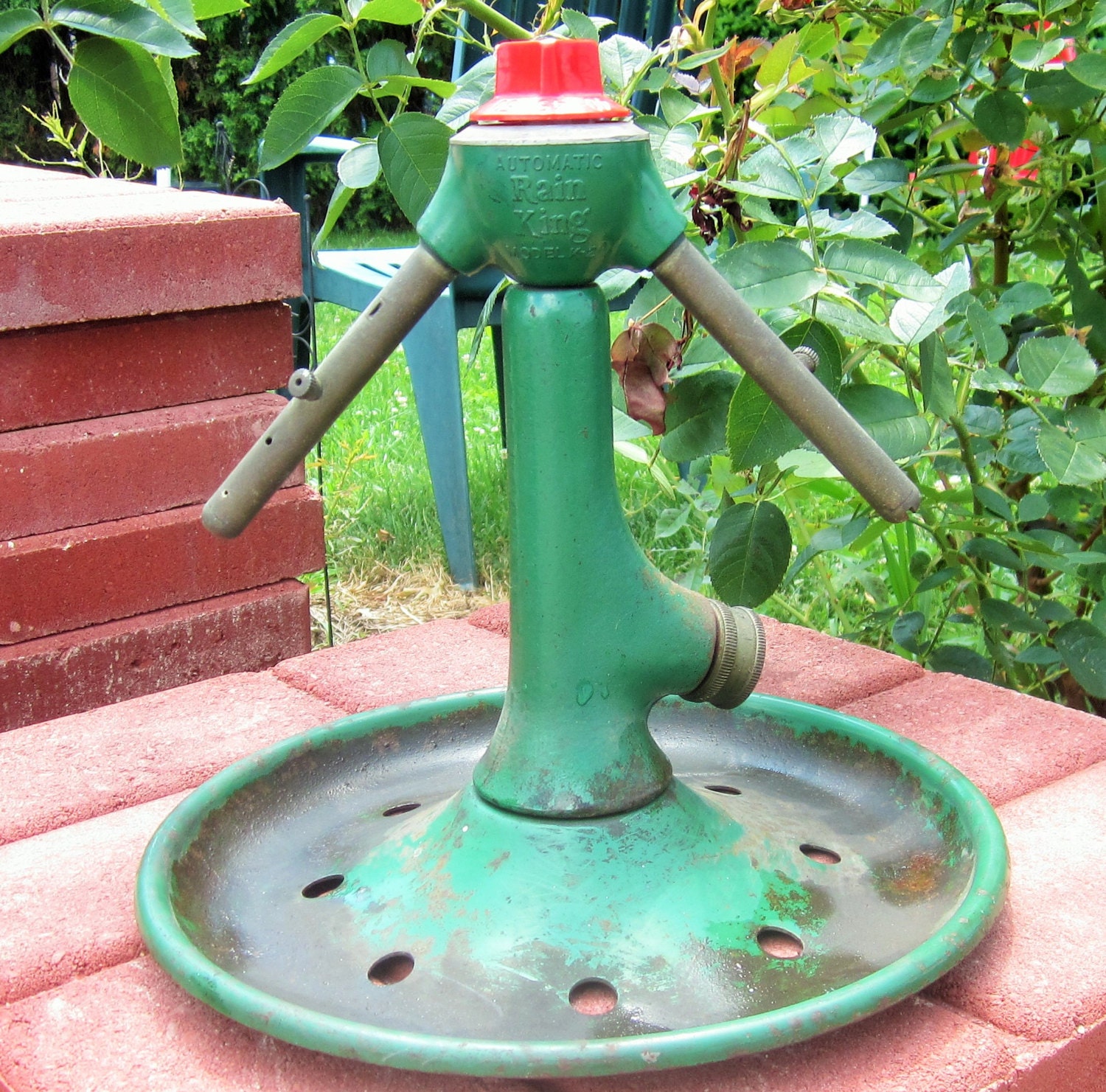 rain king sprinkler antique