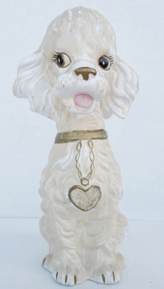 white ceramic poodle