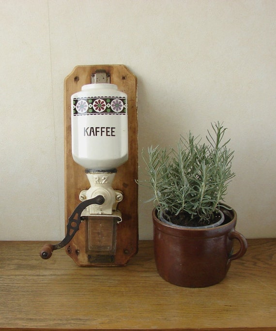 Antique coffee grinder. Wall hanging coffee mill by