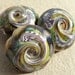 Desert Serpent- handmade lampwork bead lentils in ivory raku and striped serpent cane- set of 3