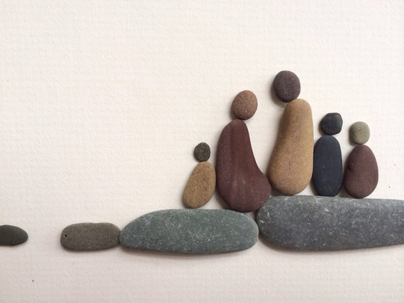 Family of five pebble picture by sharon nowlan