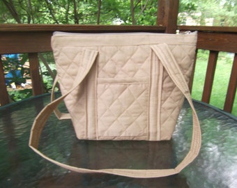 tan quilted purse