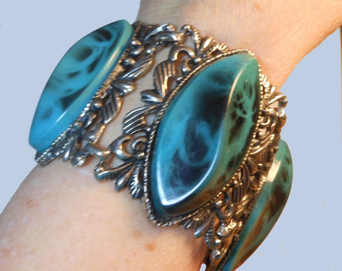 Large faux turquoise thermoset, four panel bracelet and clip earrings Southwest style