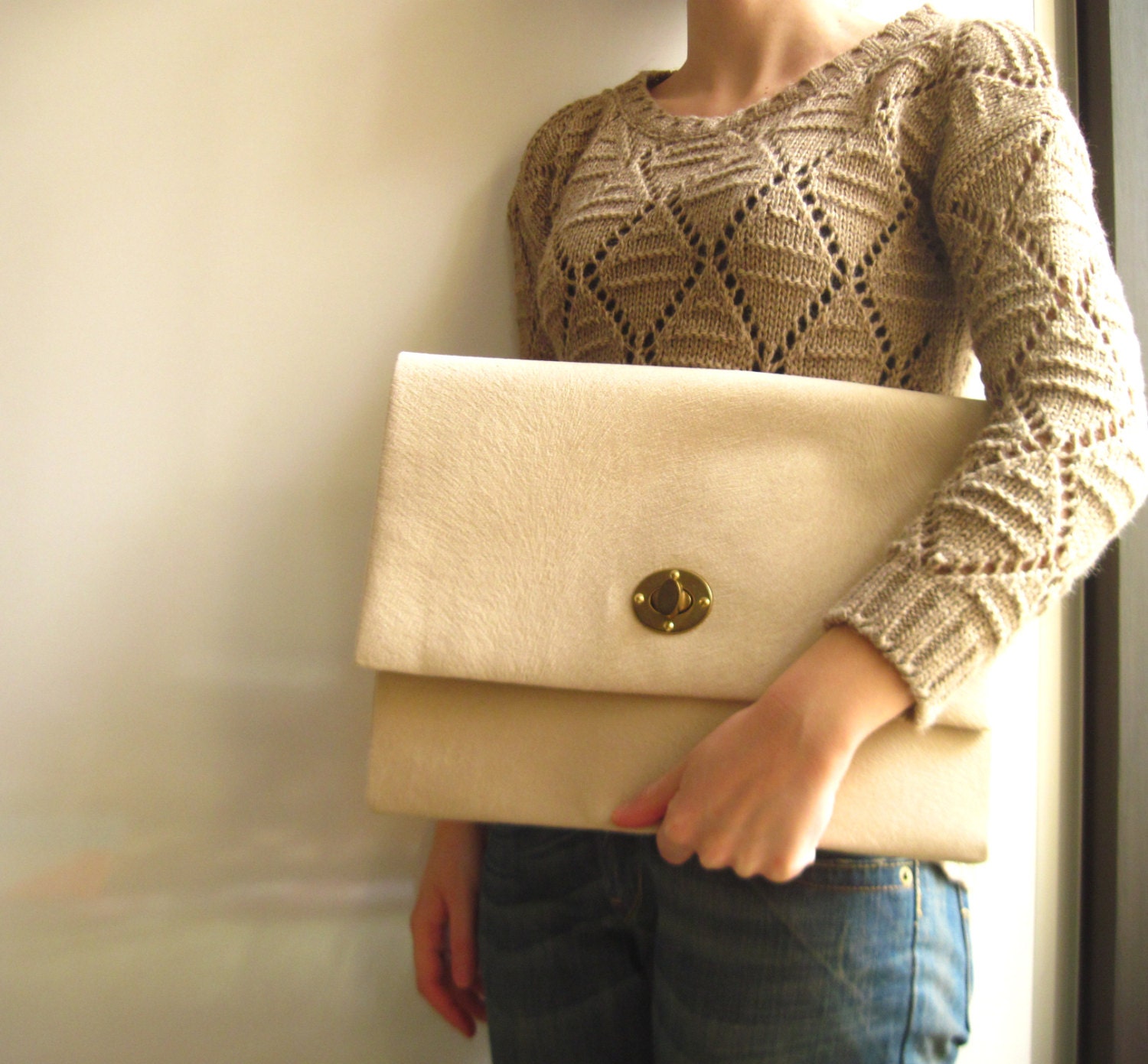 cream woven clutch bag