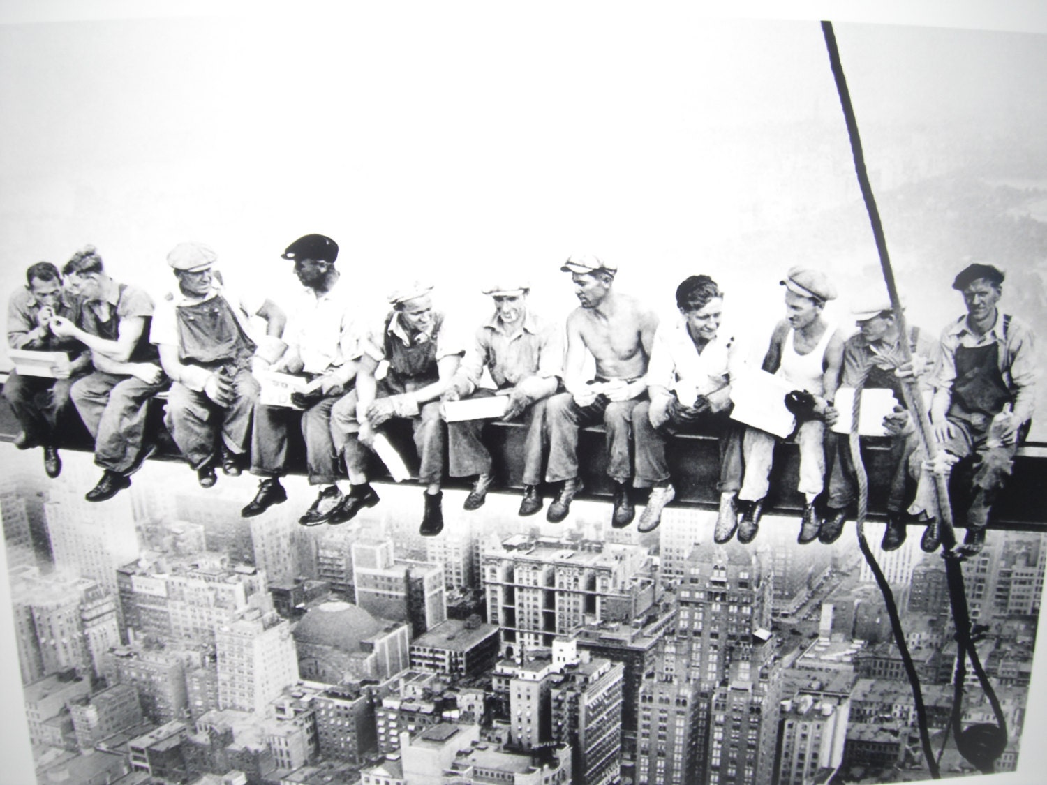 Rare New York skyscraper 'lunch break' photo : A incredible image capturing a stunning scenery. Its tones are striking and blend ideally. The arrangement looks fantastic, with the particulars are extremely defined.