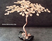 Rose gold wire tree sculpture