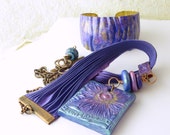 REDUCED!  Metallic sunflower polymer clay necklace, purple embossed copper bail, Shibori pleated silk ribbon, purple cuff bracelet set