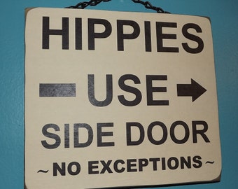 Hippies Use Side Door on Hanging Wall Sign