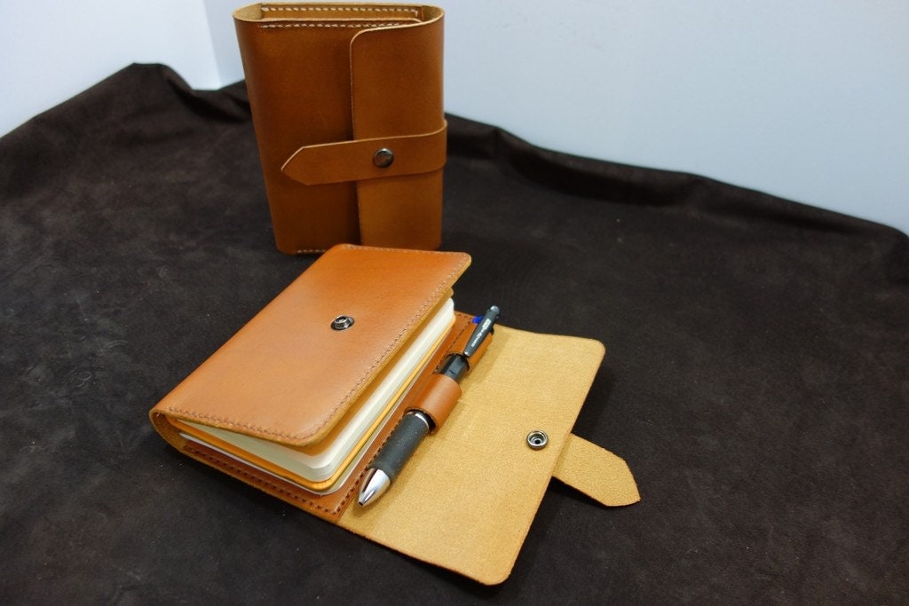 Pocket Sized Notebook & Journal Cover with Pen by StrideRidge