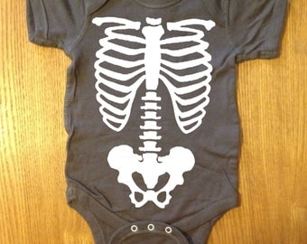 funny baby vs skeletonphoto