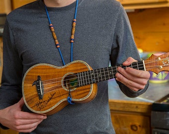 Handmade beaded adjustable ukulele strap that hooks in to the sound hole