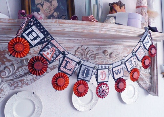 handmade Halloween pennant banner with paper rosettes