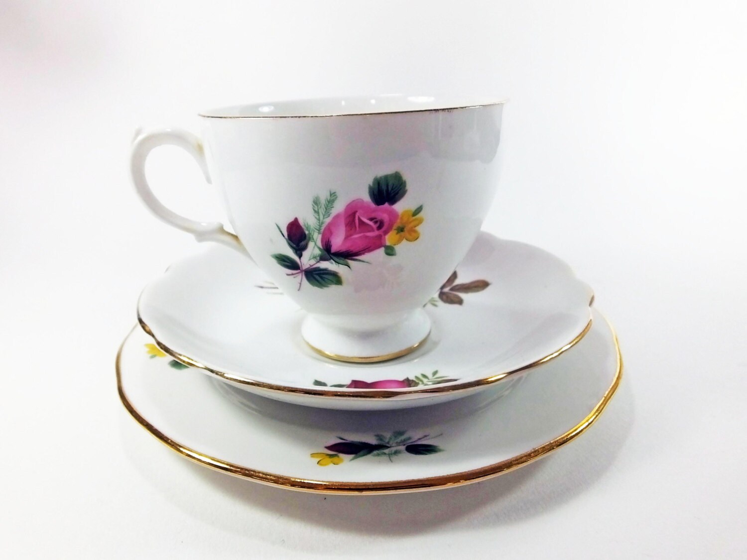 Gainsborough and Harleigh china teacup and saucer trio gilded pink