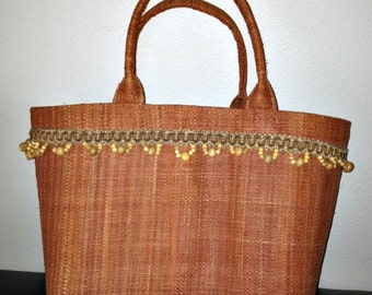 red raffia bag