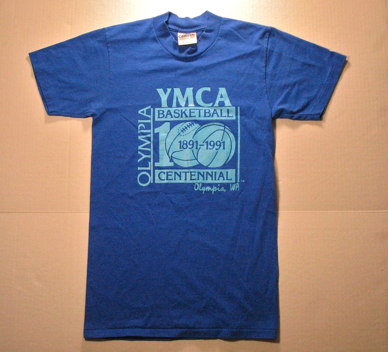 olympia sports tee shirts