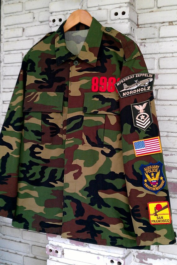 Vintage Patched Military Camo Jacket / by KodChaPhornJacket465