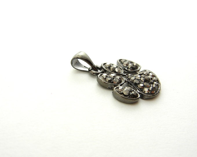 Small Rhinestone Encrusted Paw Pendant Silver-tone