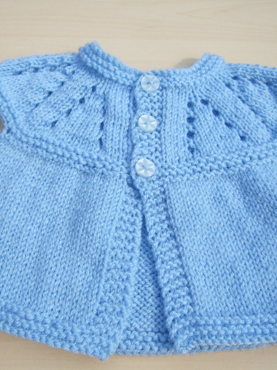 Baby sleeveless cardigan hand knitted in blue by Knittingtopia