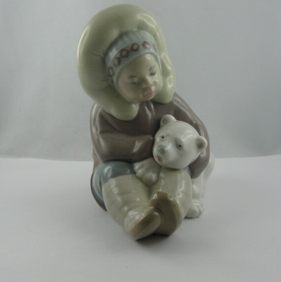 LLADRO porcelain figurine Eskimo child with polar bear.