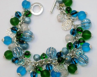 Handmade aqua blue & kelly green bead cha cha charm bracelet OOAK