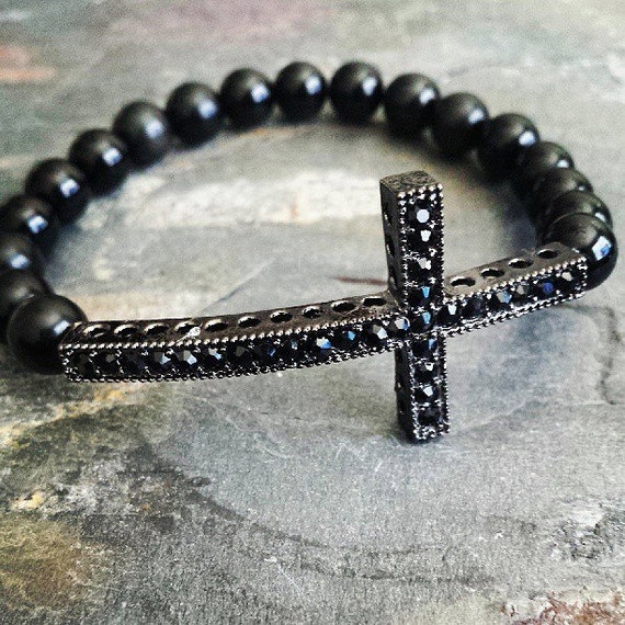 Items similar to Black Cross Bead Bracelet on Etsy