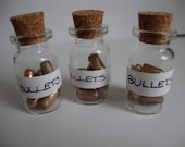Gold (Rubber) Bullets In Glass Jar Necklace