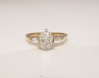 Vintage 1 Carat Center Oval Diamond Ring with Two Baguettes - GIA ...