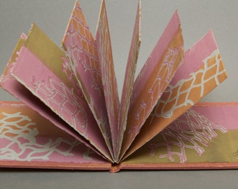 Claire, handmade artist's book with monoprints from fish nets