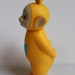 yellow teletubby toy