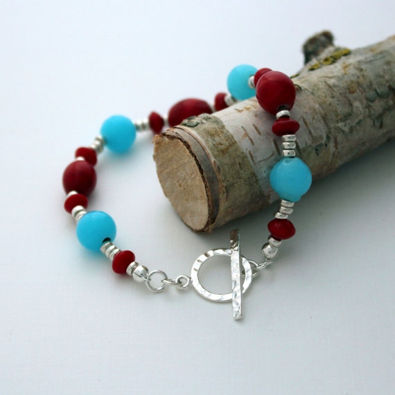 Sterling silver toggle clasp 'blushing' bracelet with red and turquoise beads on silver plated wire