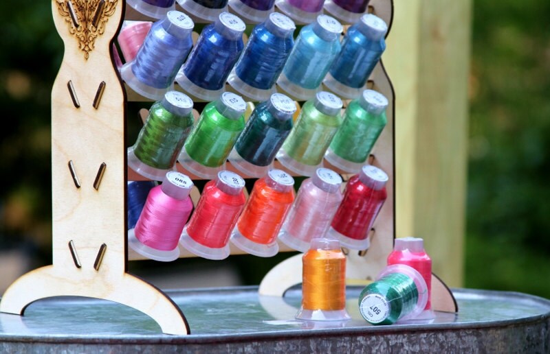 Embroidery thread organizer holds 50 spools vertically taking Embroidery thread organizer holds 50 spools vertically taking