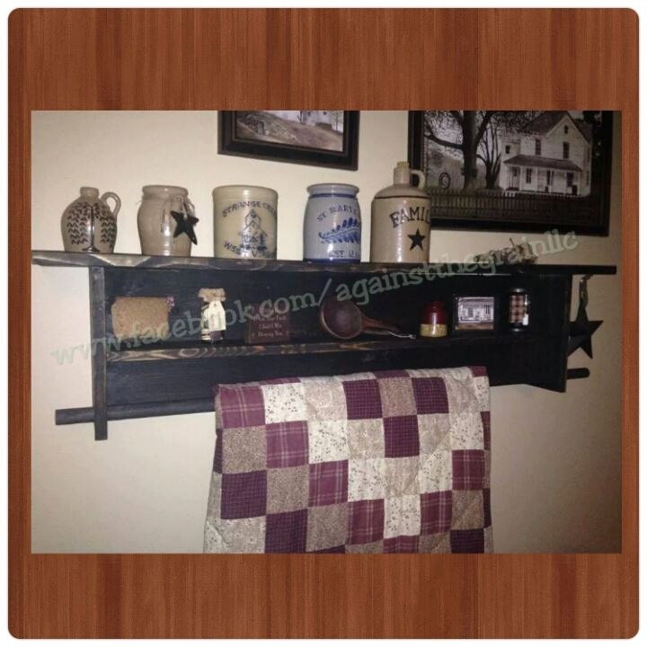 Handmade primitive wall quilt rack with center and top shelf