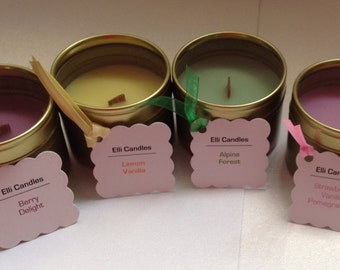 Lovely scented candles in small gold tins with clear lids and crackling wicks