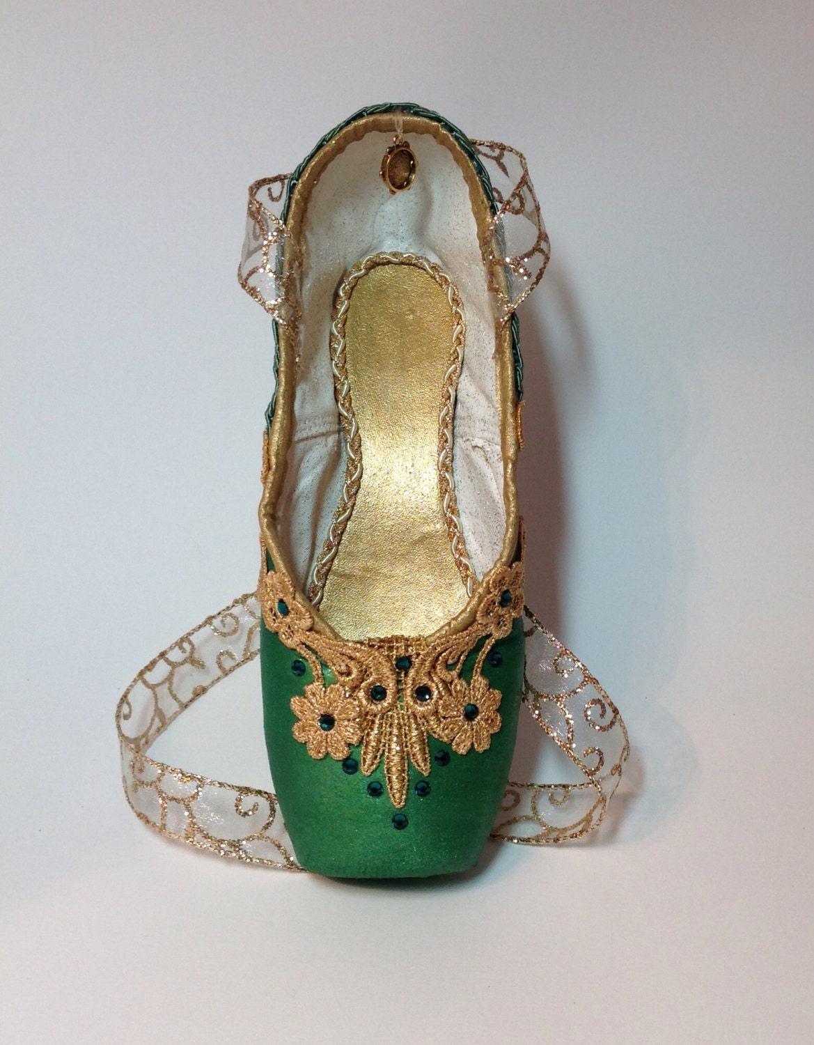 La Esmeralda decorated pointe shoe with tambourine. Ballet