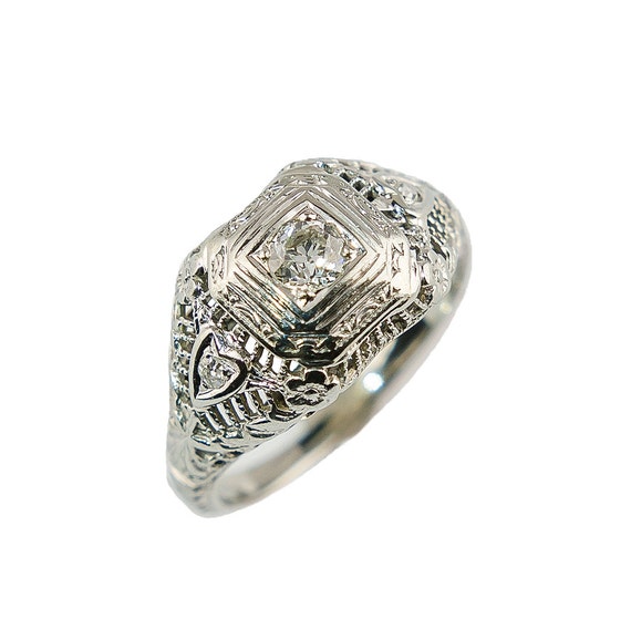 Art Deco diamond ring set in 18K WG filagree
