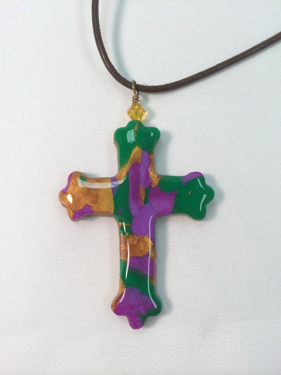 Items similar to Hand Crafted Polymer Clay Cross with Leather Cord by