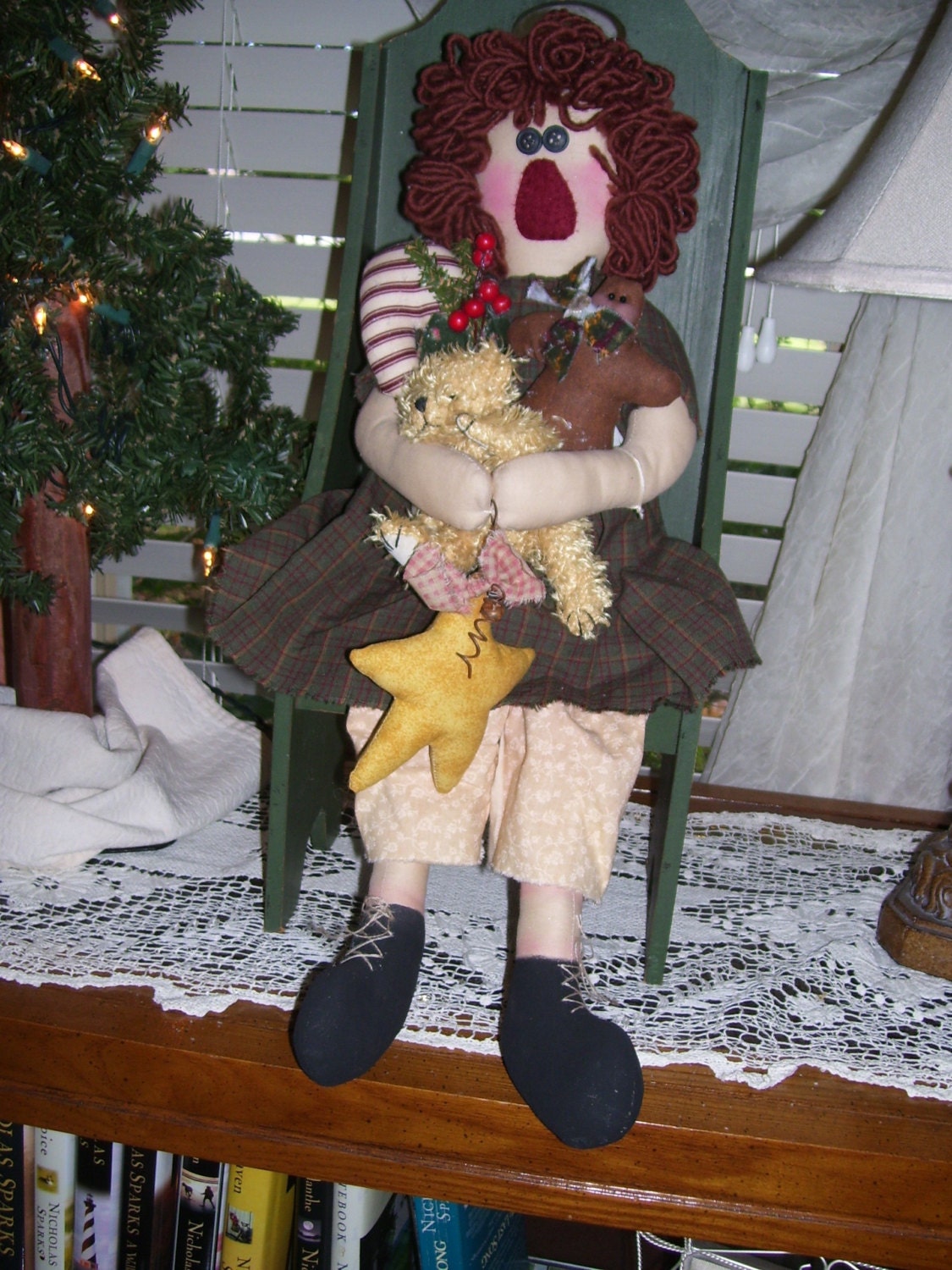 Handmade Annie holding an arm full of Christmas Greenery and Ornaments "The Ornie Collector"