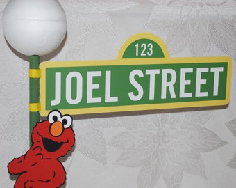 Sesame Street Sign with Lamppost and Elmo character