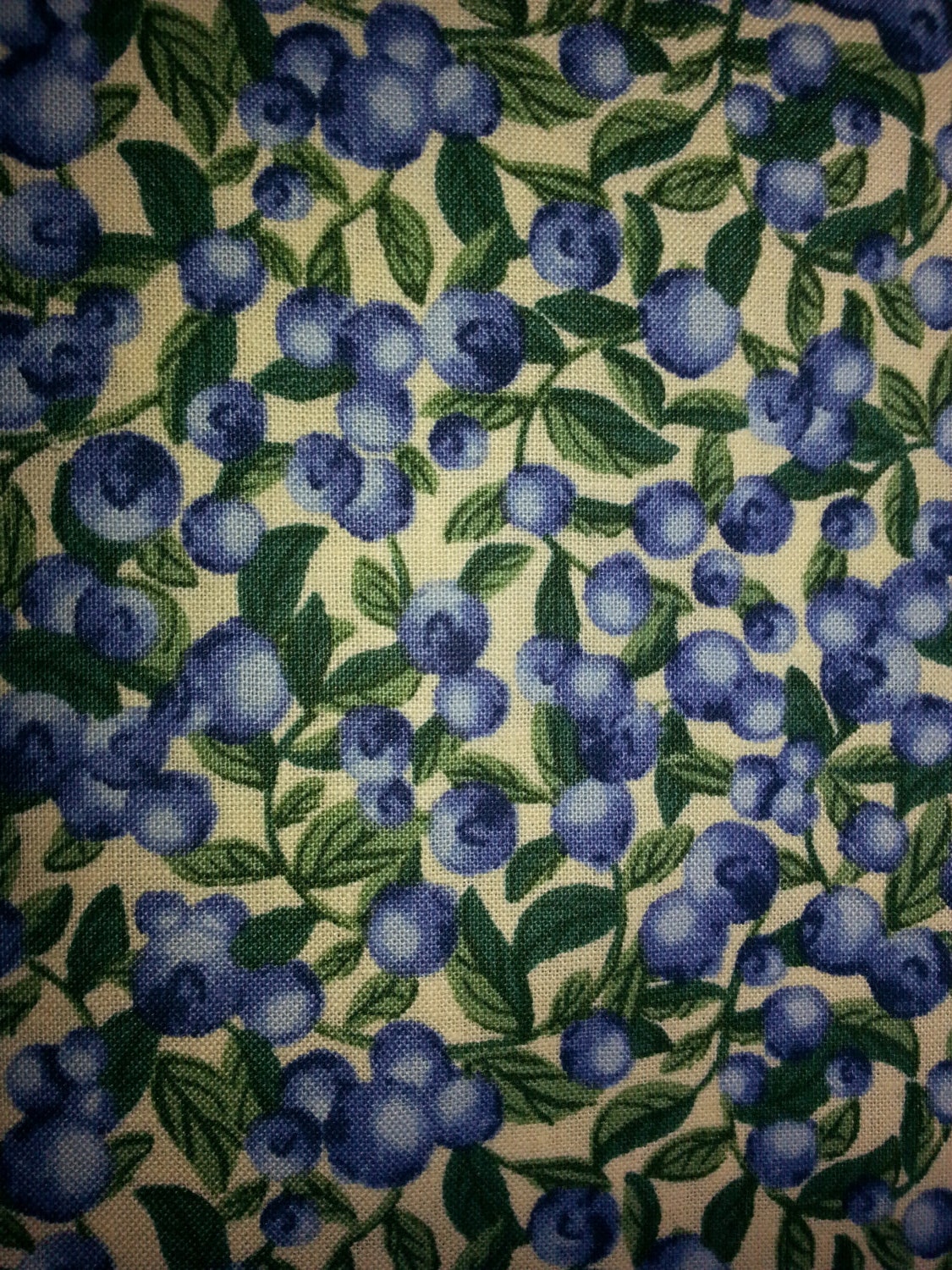 Blueberry Print Fabric On A Cream Background